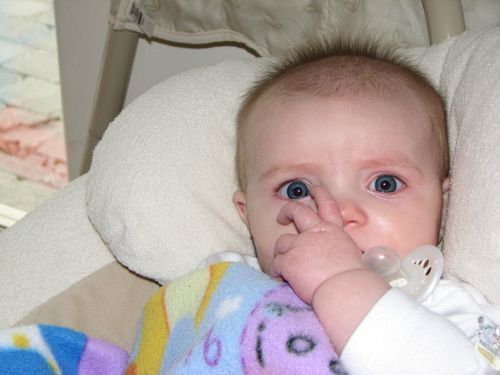 Sucking her thumb?