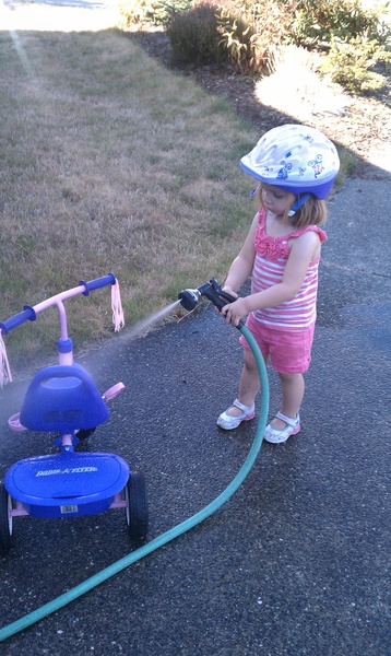 Washing Her Bike