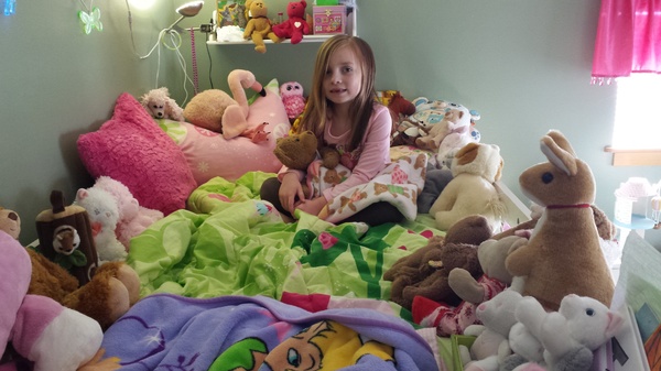 In Bed with her Animals